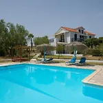 Xi Village Aparthotel
